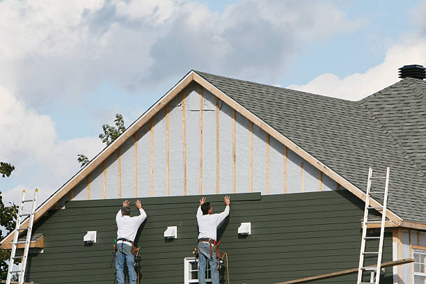 Professional Siding technician working in West Point, VA